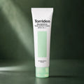 Crème Solaire Teintée Balanceful Cica SPF50+ PA++++ - visuel produit sur fond vert premium