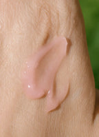 PDRN Shot 2000 Medicube — texture gel en gouttes sur peau lumineuse
