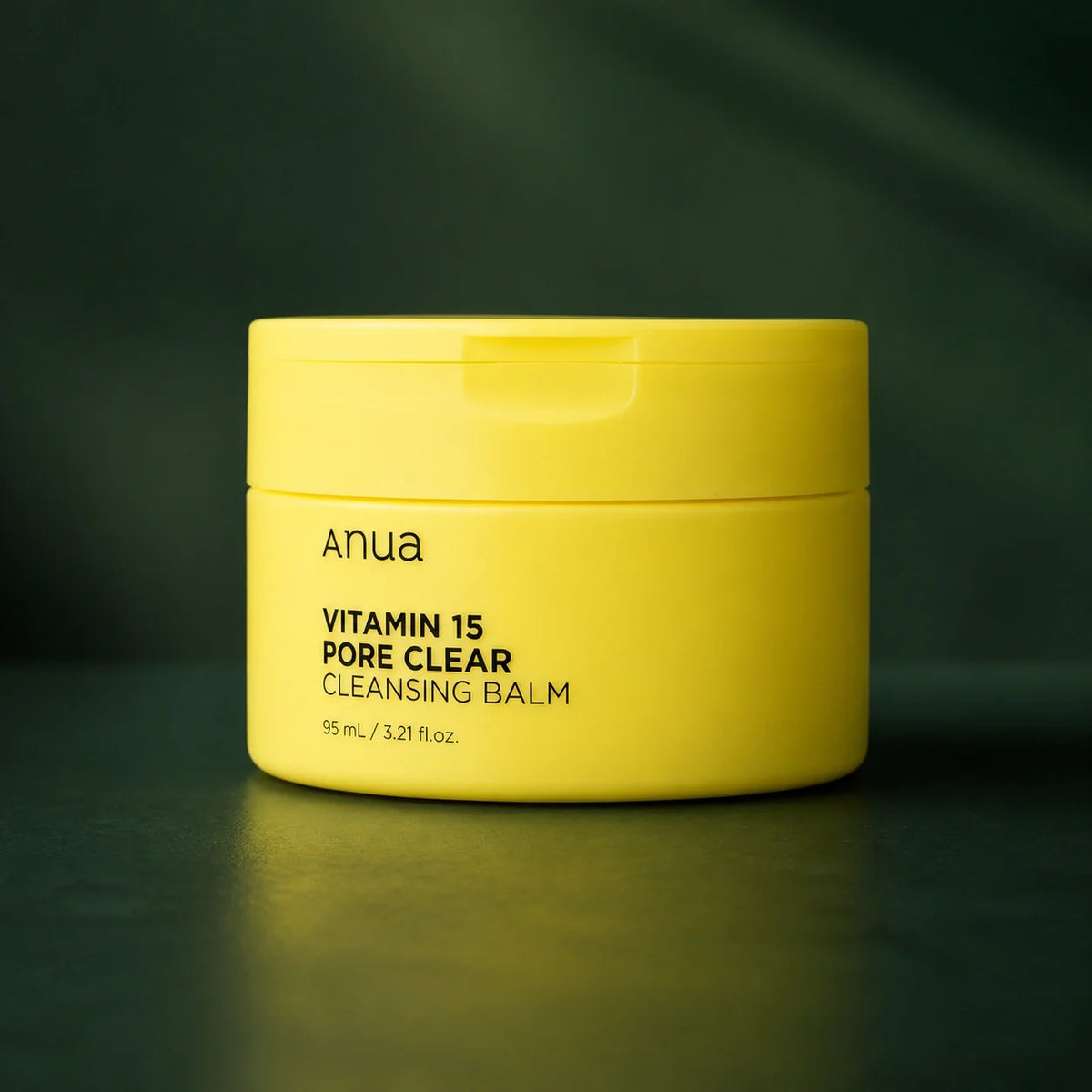 ANUA Baume Démaquillant Vitamin 15 Pore Clear 95 ml sur fond vert premium