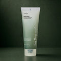 ANUA Mousse Nettoyante Heartleaf Succinic Moisture 150 ml sur fond vert premium