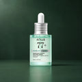 ANUA Sérum Heartleaf 77 B3Zinc 30 ml sur fond vert premium
