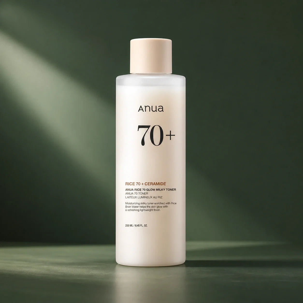 ANUA Toner Lacté Rice 70 Glow Milky 250 ml sur fond vert premium