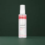 Medicube Brume Sérum PDRN Rose et Glutathion, flacon sur fond vert profond