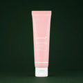 Medicube Crème Hydratante PDRN Rose et Acide Hyaluronique sur fond vert profond