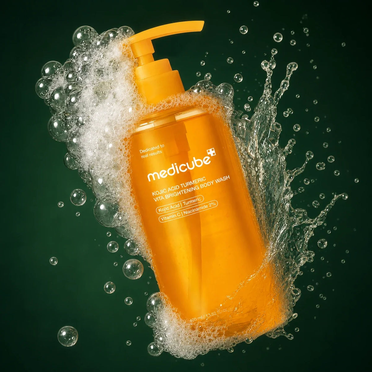 Gel lavant Medicube Kojic Acid Turmeric avec mousse et éclaboussures