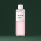 Medicube Lotion Tonique Apaisante PDRN Rose Cica, flacon sur fond vert profond