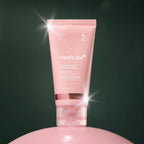 Medicube Masque de Nuit au Collagène – tube du masque sur fond vert premium