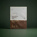 Masque Medicube Deep Peptide Radiance sur fond vert profond