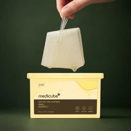 Medicube Masques Express Deep Vita C – boîte de masques sur fond vert premium