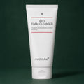 Medicube Nettoyant Moussant Red – tube nettoyant sur fond vert premium