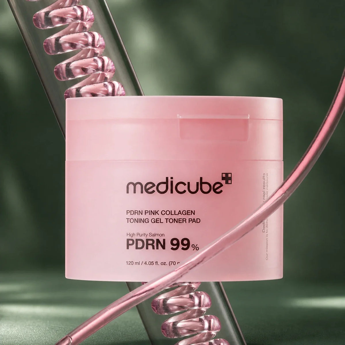 Pot Medicube PDRN Pink Collagen et spirales sur fond vert profond