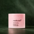 Pads tonifiants Medicube PDRN Rose Collagène sur fond vert profond
