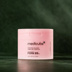 Pads tonifiants Medicube PDRN Rose Collagène sur fond vert profond