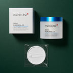 Medicube Pads Zero Pore 2.0 – coffret et pot sur fond vert premium