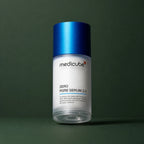 Flacon Medicube Zero Pore Serum 2.0 en studio vert