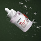 Ampoule Fermeté Red Lacto Collagen MEDIPEEL – vue 3 sur fond vert profond.