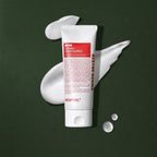 Baume Démaquillant Red Lacto Collagen MEDIPEEL – vue 2 sur fond vert profond.