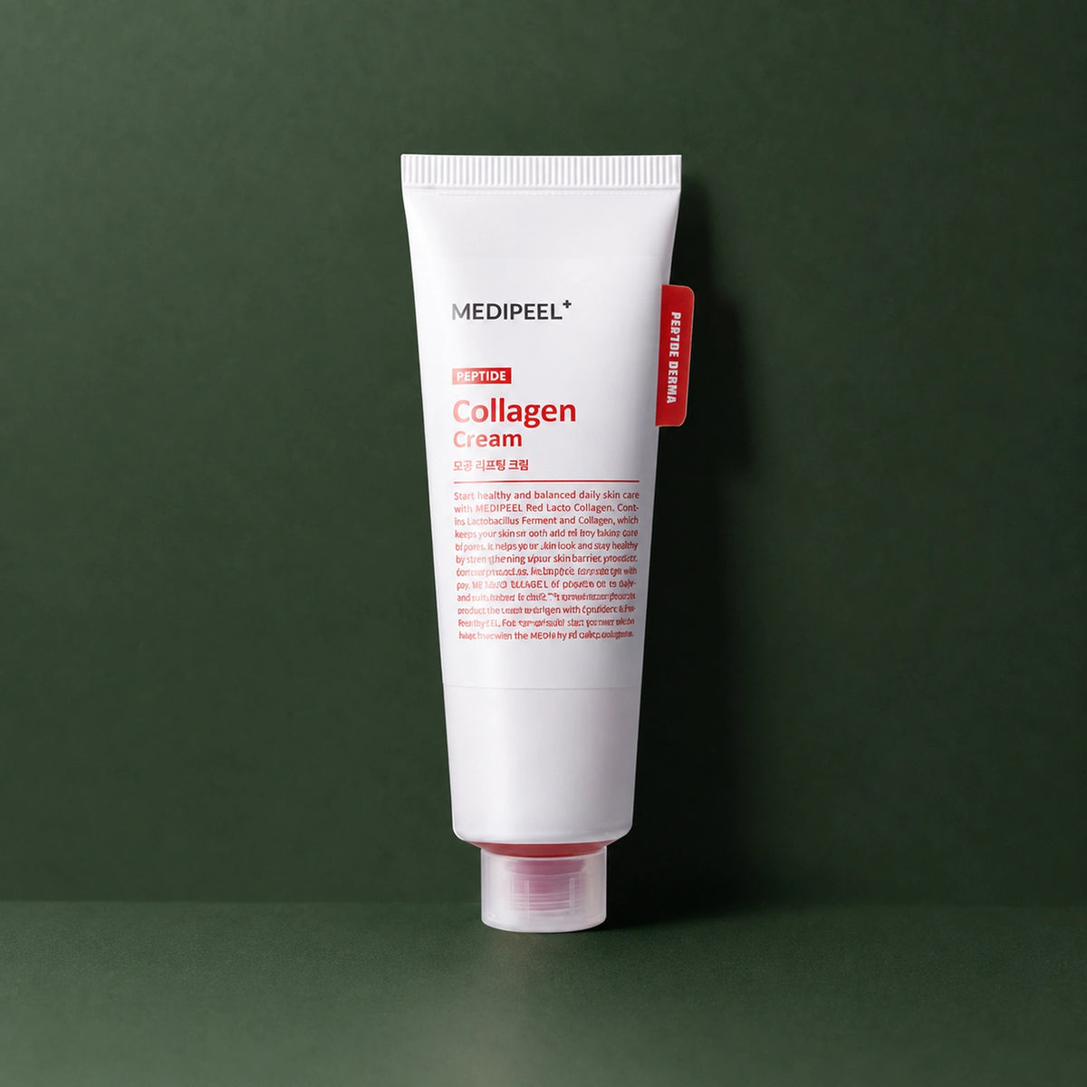 Crème Barrière Red Lacto Collagen MEDIPEEL – vue 4 sur fond vert profond.
