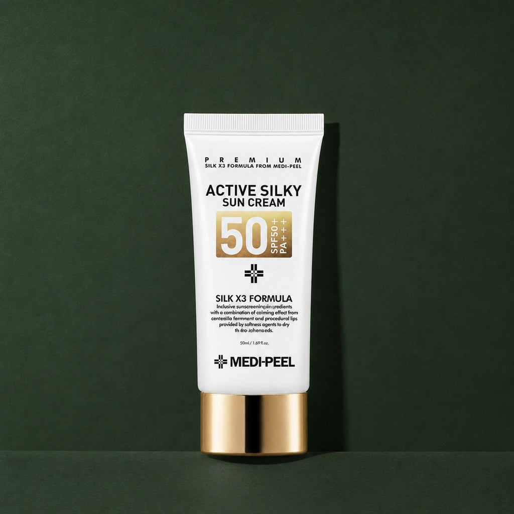 Crème Solaire Visage Soyeuse SPF50+ PA+++ MEDIPEEL – vue principale sur fond vert profond.