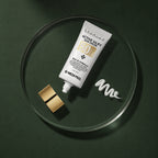 Crème Solaire Visage Soyeuse SPF50+ PA+++ MEDIPEEL – vue 4 sur fond vert profond.