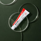 Crème Visage Exfoliante AHA BHA 28 Jours MEDIPEEL – vue 2 sur fond vert profond.