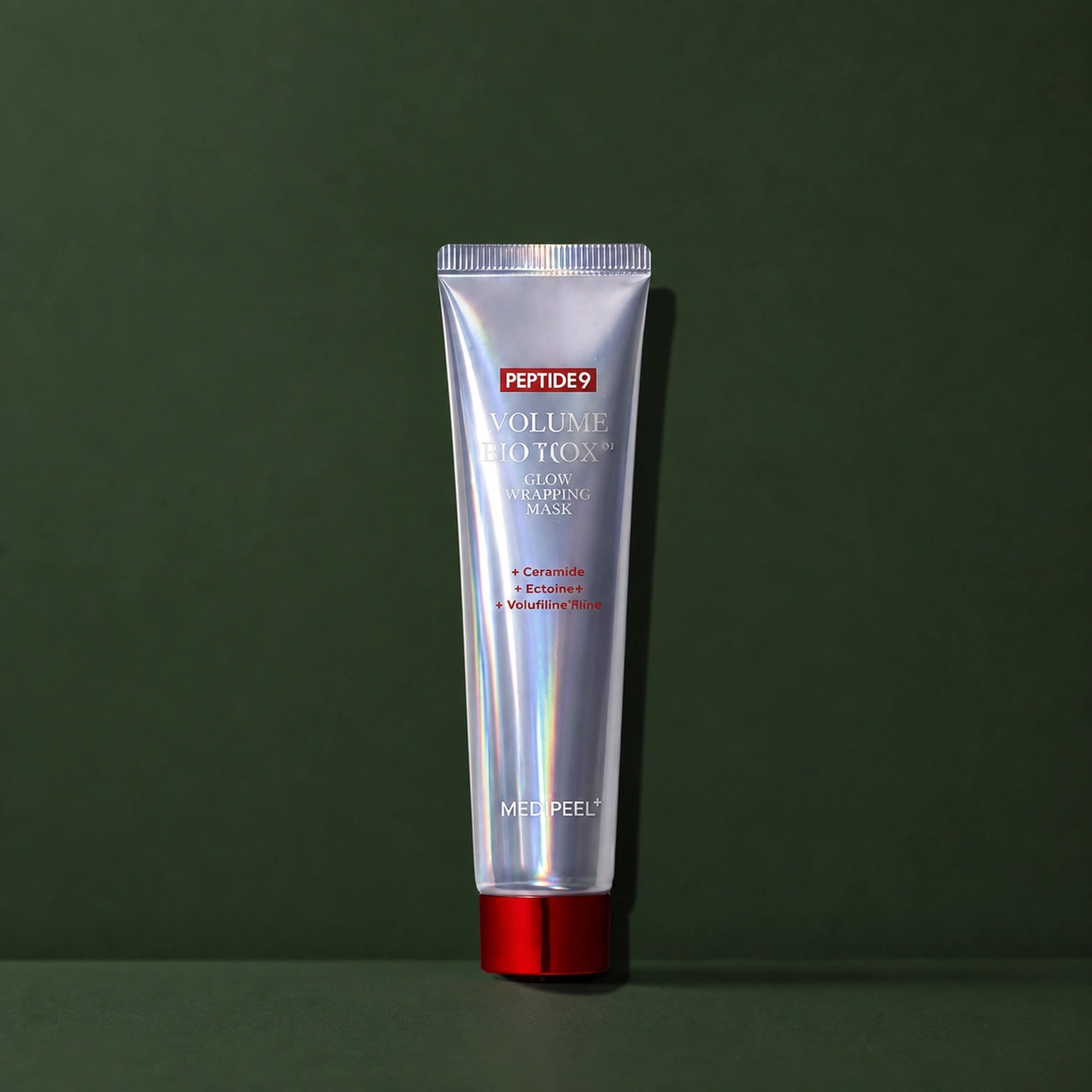 Masque Peel-Off Éclat Peptide 9 Bio Tox MEDIPEEL – vue principale sur fond vert profond.