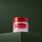 Pads Tonifiants Red Lacto Collagen Double Tight MEDIPEEL – vue principale sur fond vert profond.