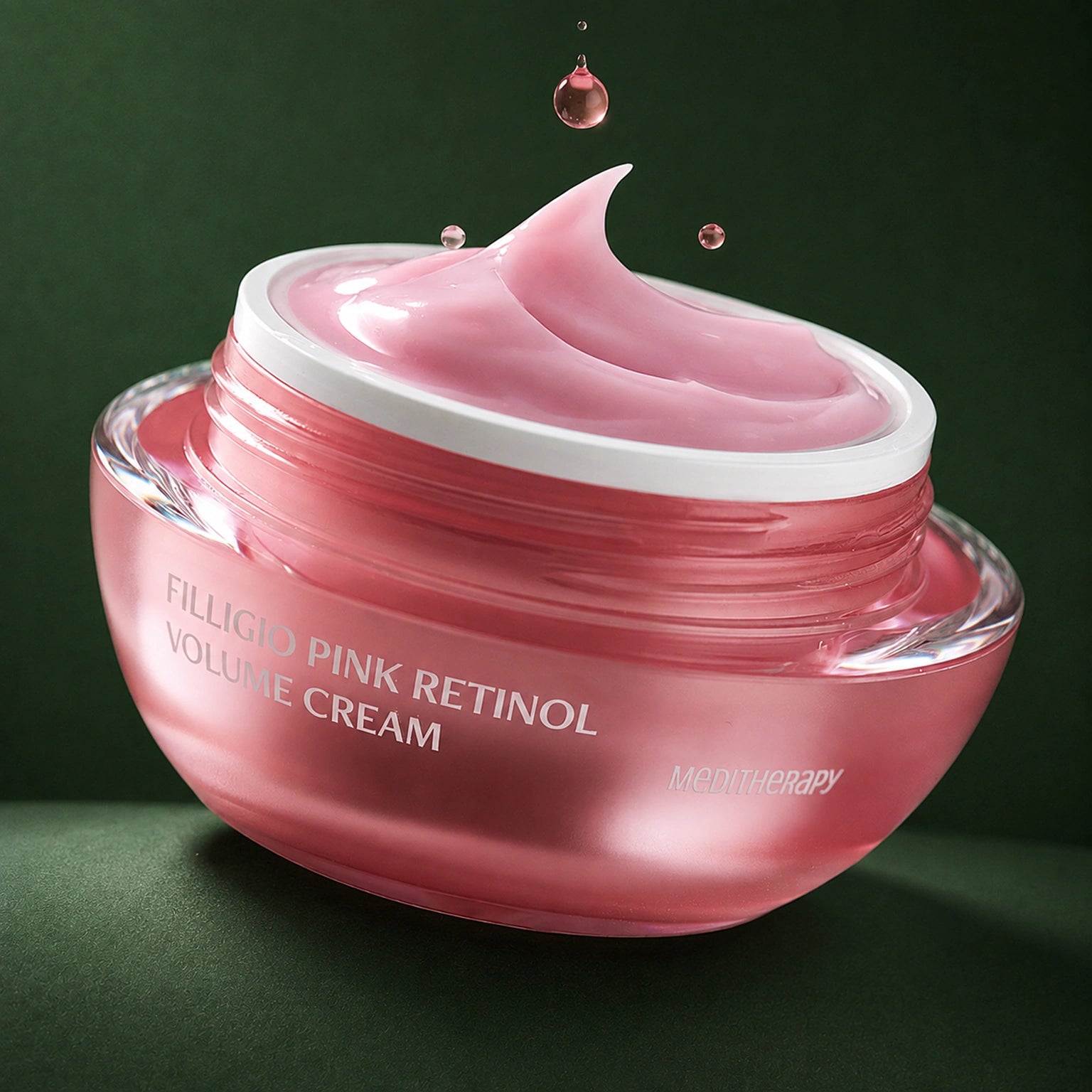 MEDITHERAPY Filligio Pink Retinol Volume Cream 50ml + EMS Device Set (*It can only be shipped via express service.) MEDITHERAPY – vue 3 sur fond vert profond.