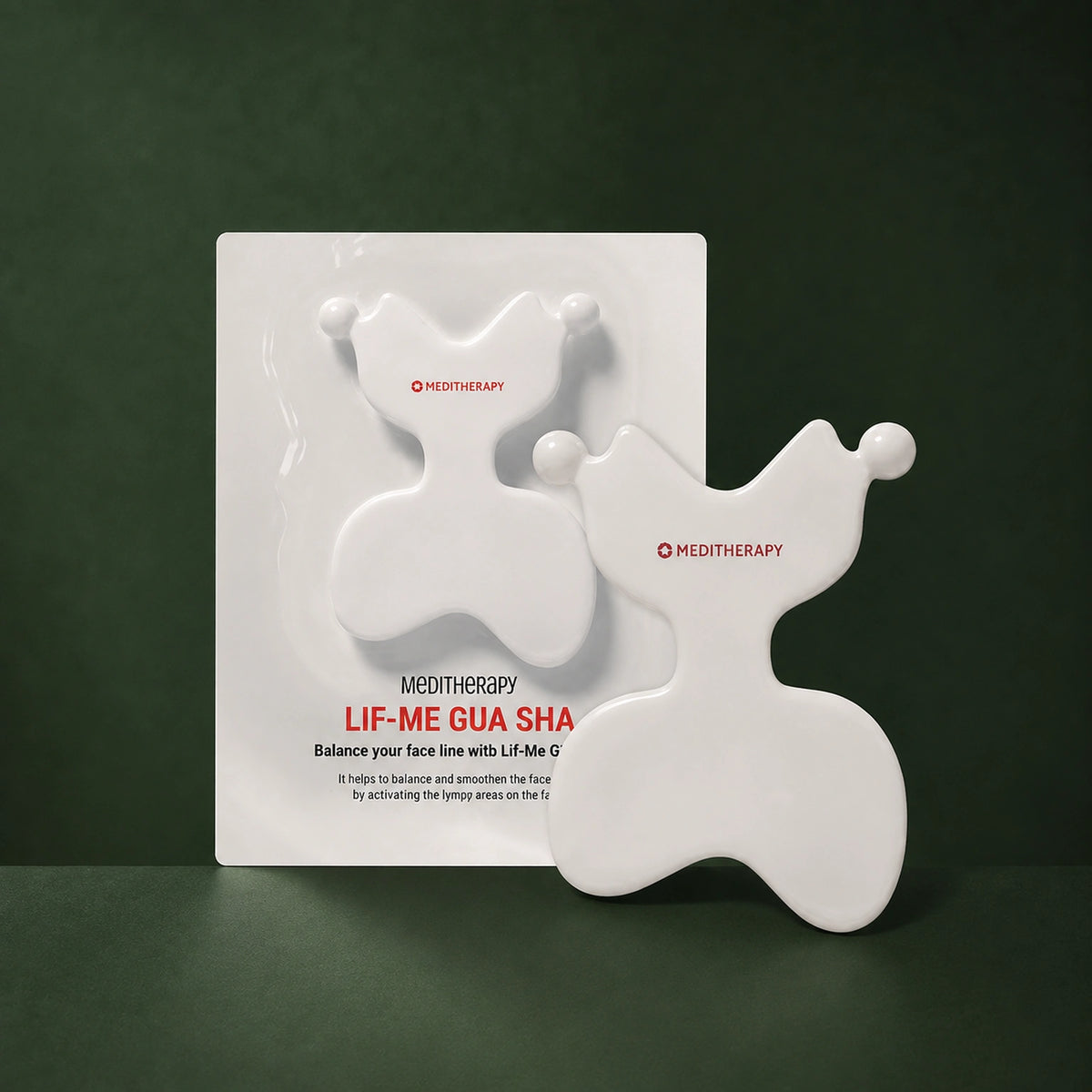 MEDITHERAPY LIF-ME GUA SHA MEDITHERAPY – vue principale sur fond vert profond.