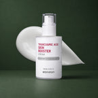 MEDITHERAPY Tranexamic Acid Skin Booster Cream 100ml MEDITHERAPY – vue principale sur fond vert profond.