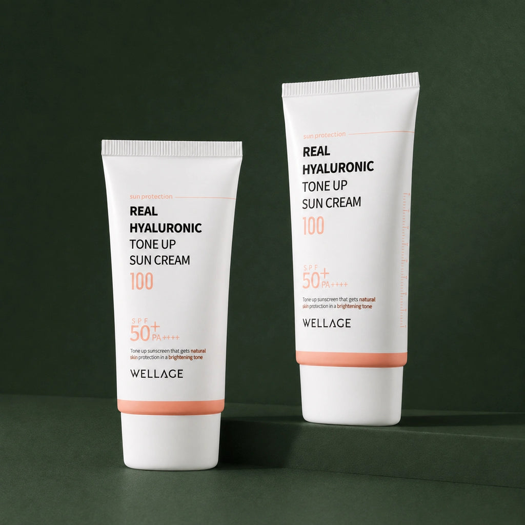Crème Solaire Teintée Rosée SPF50+ PA++++ WELLAGE sur fond vert profond