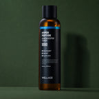 Lotion Tonique Booster aux Peptides WELLAGE sur fond vert profond
