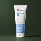 Mousse Nettoyante Hyaluronique aux Acides Aminés WELLAGE sur fond vert profond