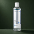 Tonique Visage Hyaluronique 100 WELLAGE sur fond vert profond